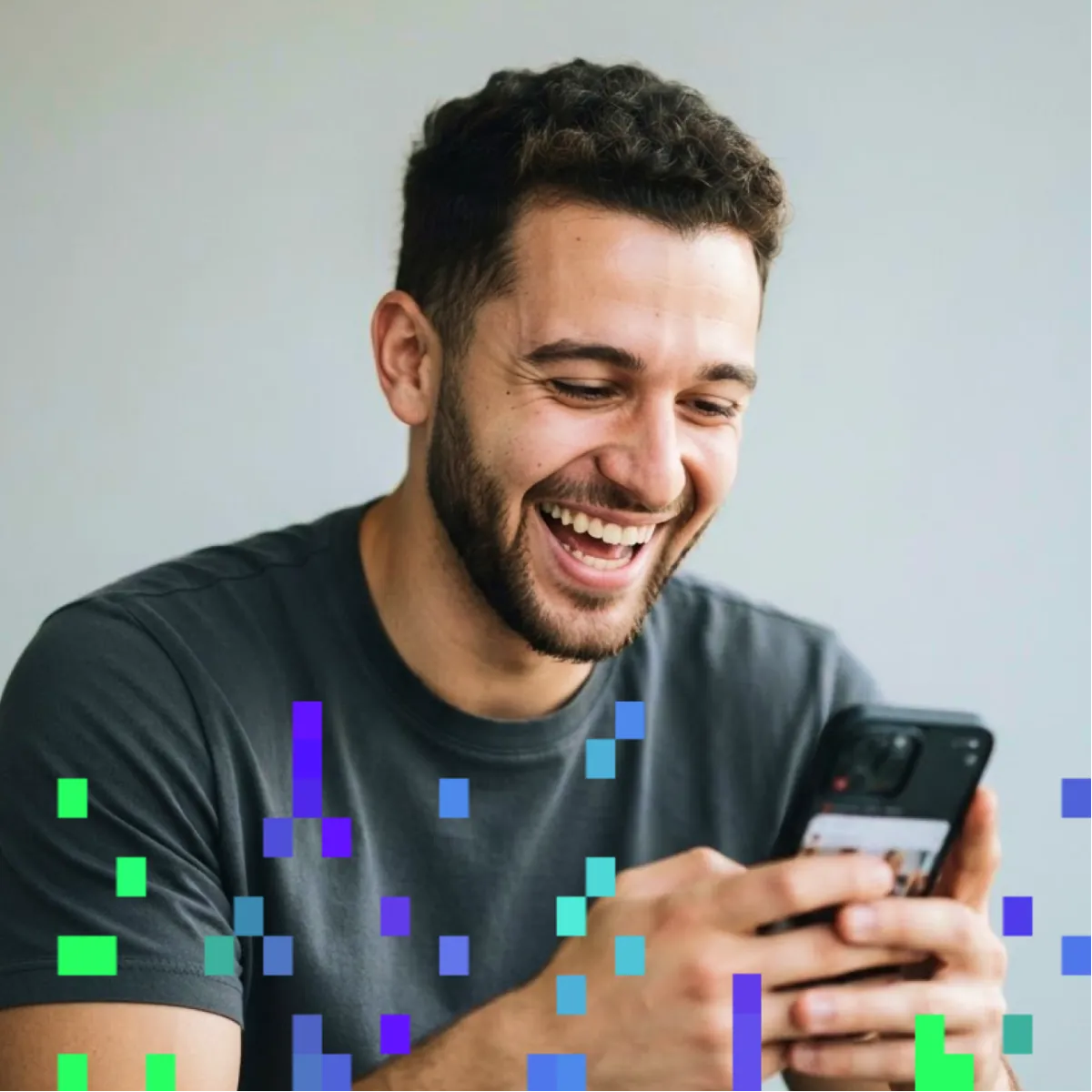 A competition operator smiling at his phone.