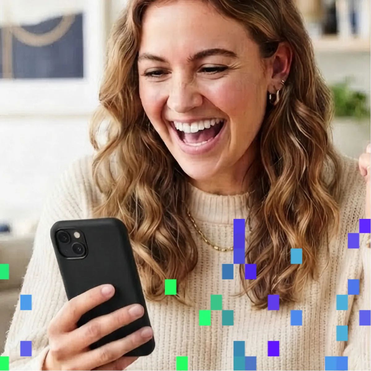 A player laughing at her phone.